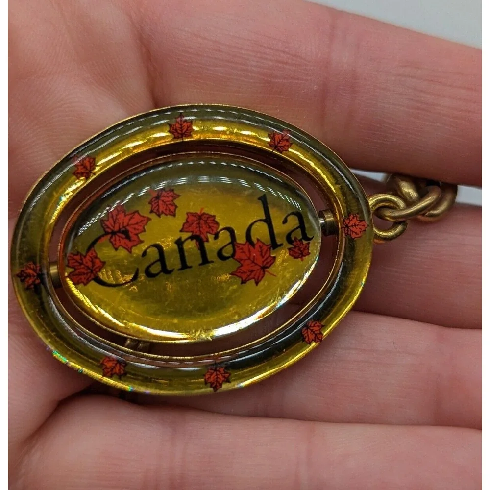 Vintage Canada Flippable Swivel Metal Enamel Keychain 4